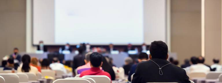 People listening to a conference 